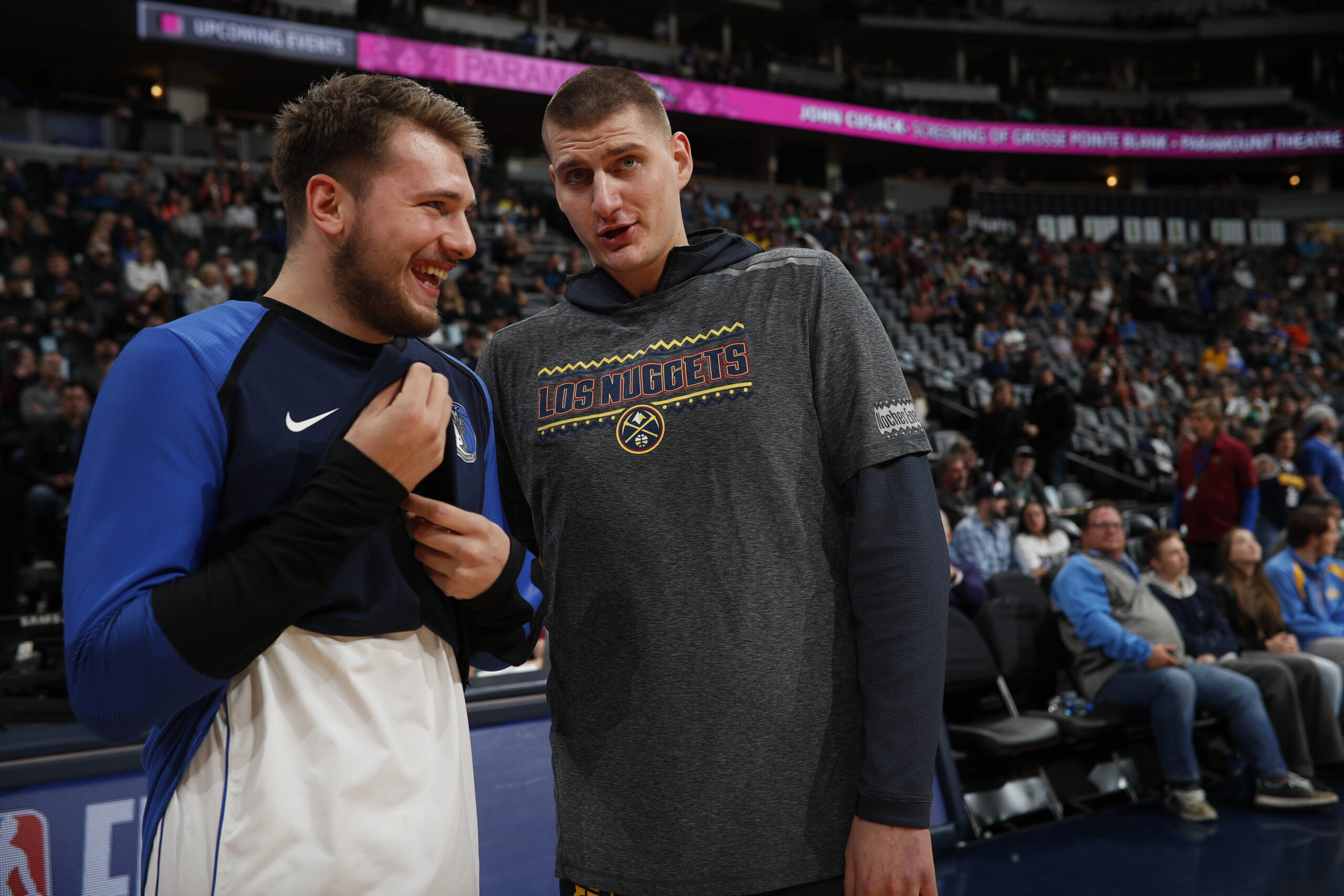 Dallas Mavericks forward Luka Doncic (77), Denver Nuggets center Nikola Jokic (15)