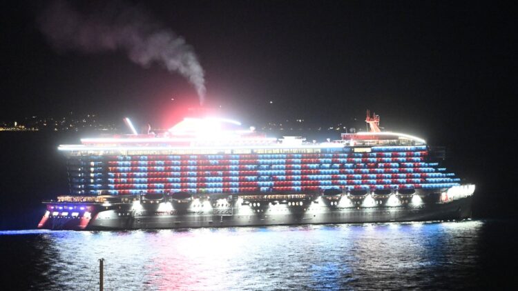Split, Croatia, 171023. On the Resilient Lady cruise ship of Virgin Voyages in front of the port of Split, the message V