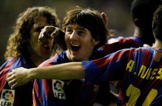 Barcelona's Lionel Messi (C)