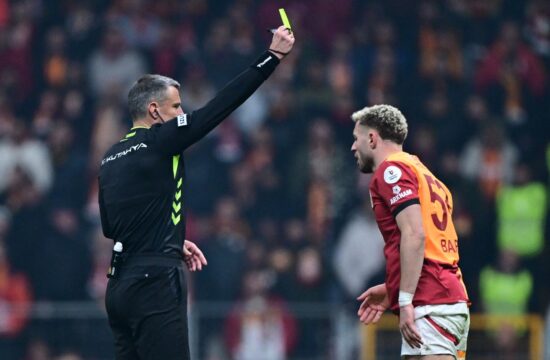ISTANBUL, TURKIYE - FEBRUARY 24: Slovenian referee Slavko Vincic shows yellow card to Baris Alper Yilmaz of Galatasaray during the Turkish Super Lig week 25 football match between Galatasaray and Fenerbahce at RAMS Park in Istanbul, Turkiye on February 24, 2025. Abdulhamid Hosbas / Anadolu,Image: 968479088, License: Rights-managed, Restrictions: , Model Release: no