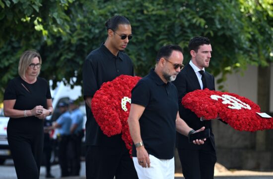 Virgil van Dijk in Andrew Robertson.