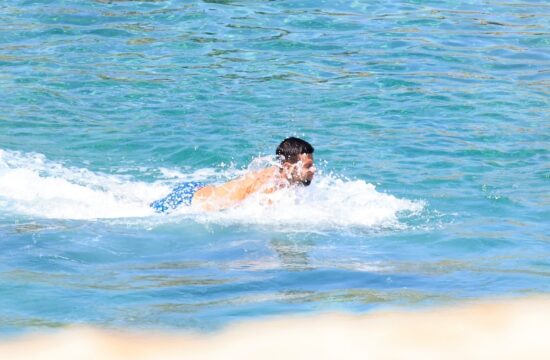 *EXCLUSIVE* Serbian tennis player Novak Djokovic and his Wife Jelena Pack on the PDA during a Family Beach Day at Nammos Beach in Mykonos.