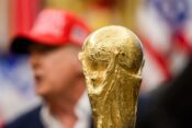 President Donald Trump, flanked by Vice President JD Vance and FIFA President Gianni Infantino, announces that the FIFA World Cup 2025 draw will take place on December 5 at the Kennedy Center, Friday, August 22, 2025 (Official White House Photo by Daniel